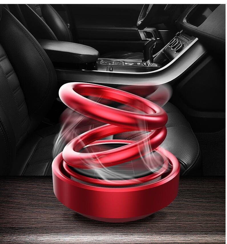 Ambientador solar para coche con rotación automática y aromatizante para asiento.