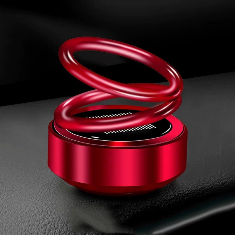 Ambientador solar para coche con rotación automática y aromatizante para asiento.
