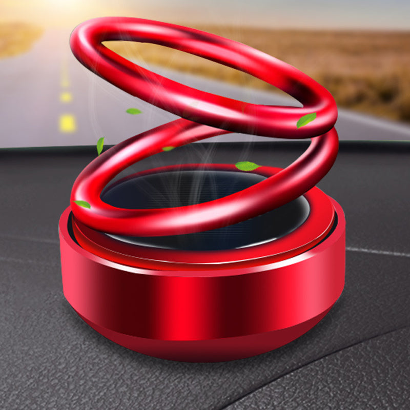 Ambientador solar para coche con rotación automática y aromatizante para asiento.